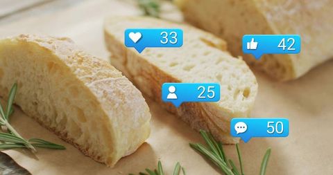 Displaying rustic bread slices with social media notification badges and rosemary