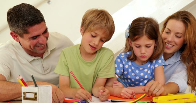 Happy Family Engaging in Educational Activities at Home - Download Free Stock Images Pikwizard.com