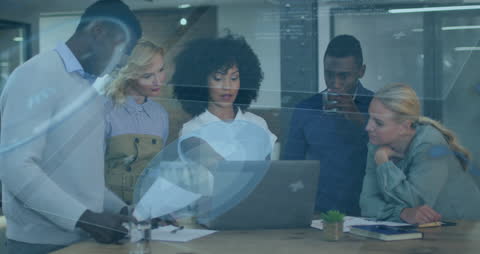 Diverse Team Focused on Technology with Digital Overlay