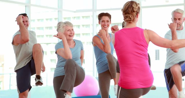 Diverse Group Participating in Energetic Fitness Class - Download Free Stock Images Pikwizard.com