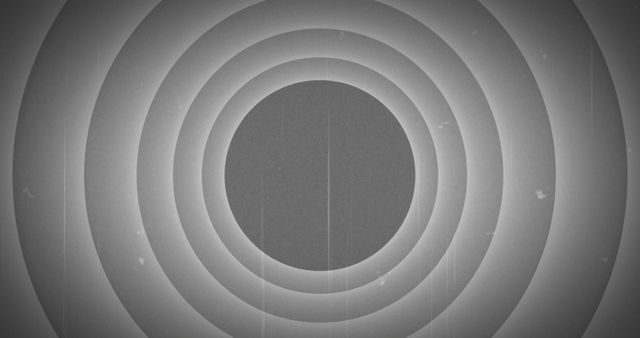 Image of tunnel of black and white colored circles with vintage film.