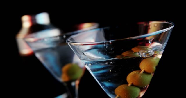 Elegant Martini Glasses with Olives in Stylish Atmosphere - Download Free Stock Images Pikwizard.com