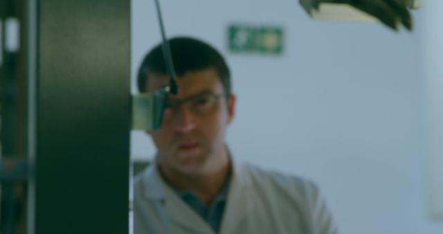 Scientist Observing Equipment in Laboratory - Download Free Stock Images Pikwizard.com