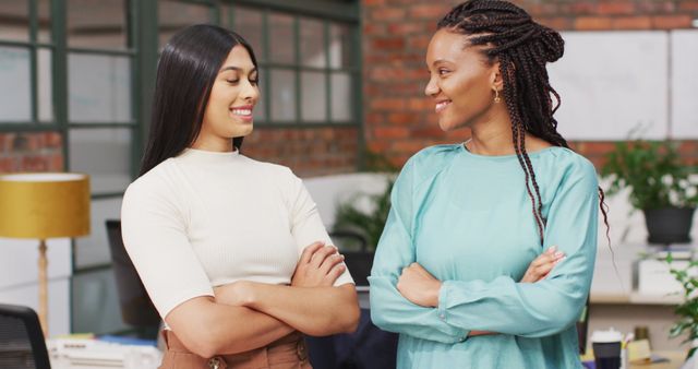 Two Confident Businesswomen Standing in Modern Office Environment - Download Free Stock Images Pikwizard.com