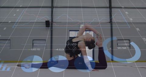 Gymnast performing deep backbend split while displaying performance data overlays