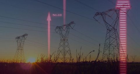 Electric pylons with digital data overlay at sunset