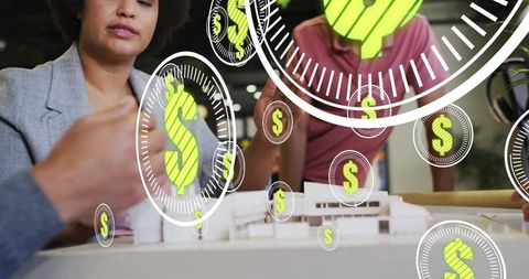 Diverse Team Analyzing Financial Growth in Modern Office Environment