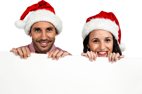 Transparent Smiling Couple in Santa Hats Holding Blank Display - Download Free Stock Videos Pikwizard.com