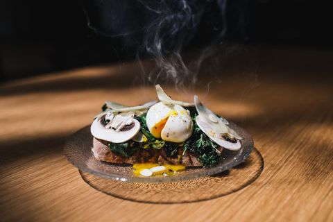 Gourmet Sandwich with Poached Egg and Mushrooms on Chic Plate