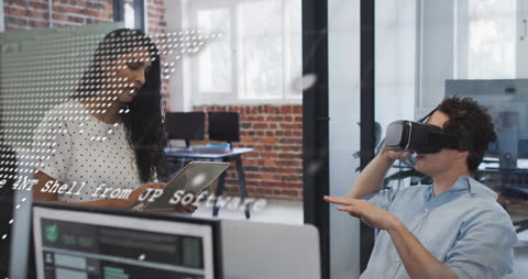 Team Innovating with Virtual Reality Technology in Modern Office