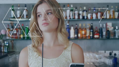 Woman Using Smartphone in Modern Bar with Geometric Design