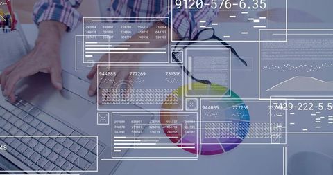 Typing analyst using laptop with data dashboard overlay and color wheel