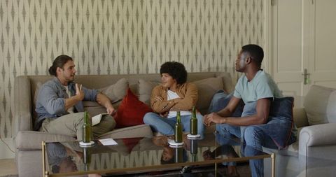 Friends Relaxing and Socializing in Cozy Living Room