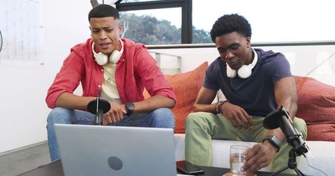 Diverse Male Friends Recording Podcast at Home Studio