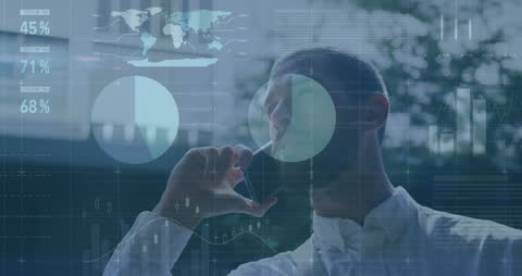 Businessman Analyzing Financial Data with Digital Display Interface