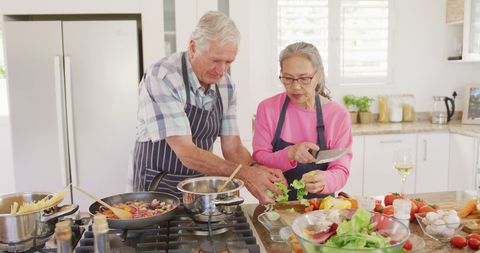 Senior Couple Cooking Together in Modern Kitchen Setting - Download Free Stock Images Pikwizard.com