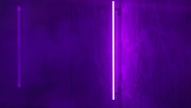 Ambient Vertical Neon Tube Illuminating Moody Purple Light