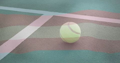 Tennis ball on vibrant green court for sport concept