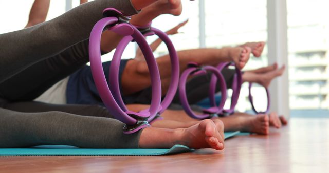 Group Pilates Class with Magic Rings in Modern Studio - Download Free Stock Images Pikwizard.com