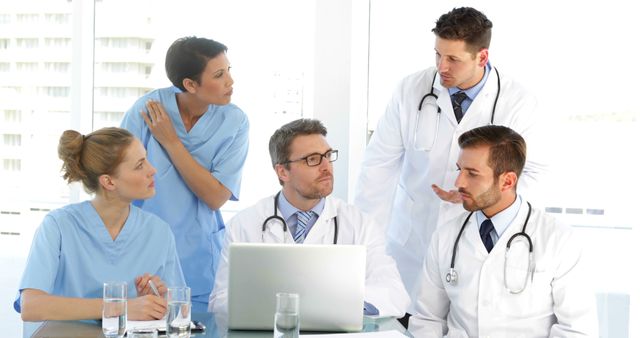 Healthcare Professionals Collaborating on Medical Research in Modern Office - Download Free Stock Images Pikwizard.com