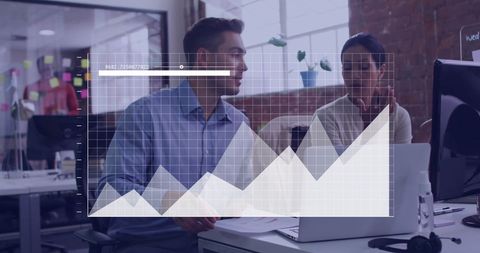 Colleagues Analyzing Financial Growth Reports in Modern Office