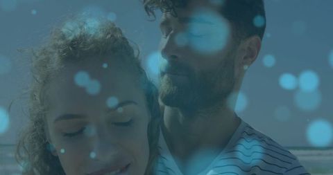 Couple embracing calm seaside serenity