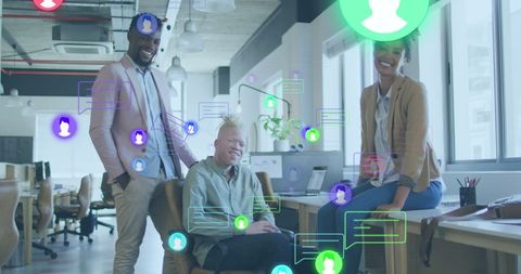 Diverse Team Embracing Digital Communication in Modern Office