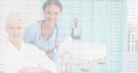 Smiling Doctor and Nurse in Modern Clinical Exam Room