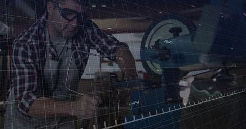 Woodworker With Digital Precision Equipment in Modern Workshop