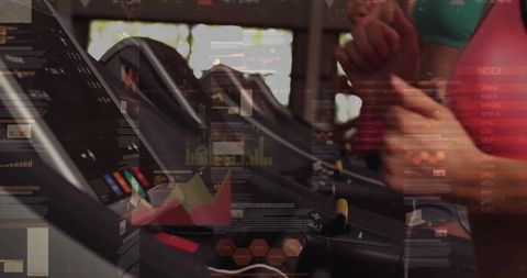 Women Adjusting Treadmills in Fitness Gym Monitoring Workout