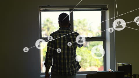 Businessman Networking through Smartphone Technology