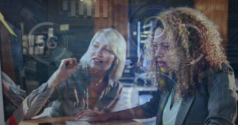 Technology Team Collaborating on Network Solutions in Modern Office