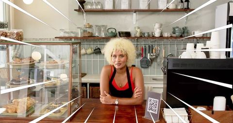 Confident barista at work in cozy café setting