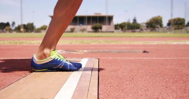 Athlete's Footwear Ready at Start Line for Track and Field Event - Download Free Stock Images Pikwizard.com