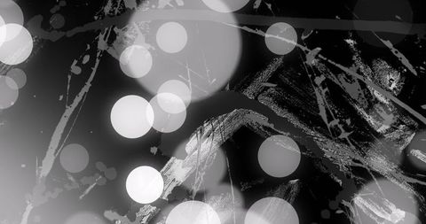 Abstract Light Circles with Dynamic Brush Strokes on Black Background