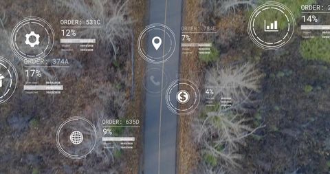 Drone capturing winter countryside two-lane road with augmented hud logistics overlays