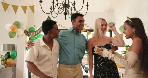 Joyful Multiracial Friends Celebrate Birthday Party Together