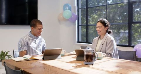 Diverse Colleagues Celebrating in Festive Office Setting