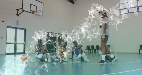 Basketball Coach Guiding Team During Court Training with Futuristic Data Network Overlay