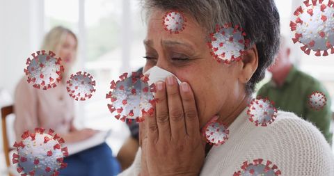 Covid-19 Cells Overlay on Woman with Allergies During Consultation