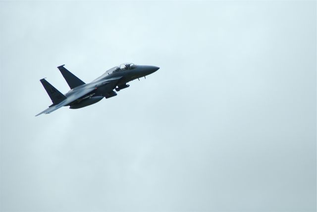 Fighter Jet Soaring Against Cloudy Sky in Daylight - Download Free Stock Photos Pikwizard.com