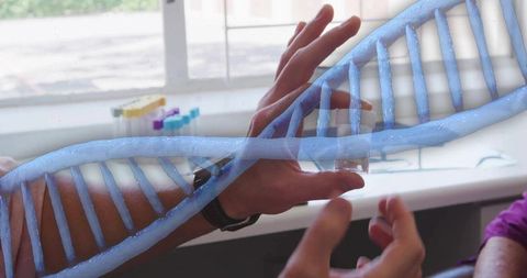 Technician passing vial to senior researcher with blue dna helix overlay on lab bench