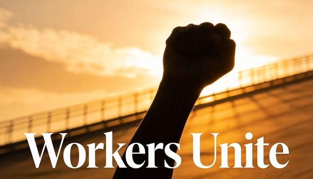 Raising clenched fist silhouette at golden sunset with workers unite headline