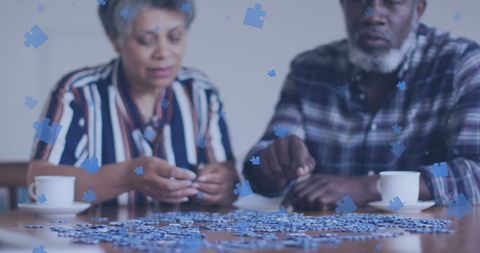 Senior Couple Engaging in Puzzle Activity Together - Download Free Stock Images Pikwizard.com