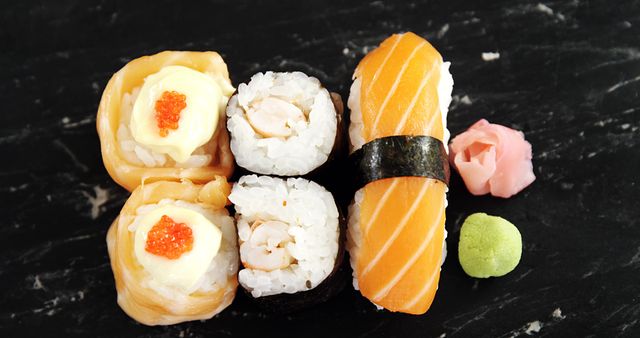 Assorted Sushi Rolls with Salmon Nigiri on Marble Surface - Download Free Stock Images Pikwizard.com