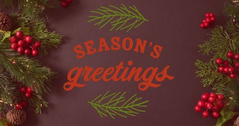 Festive season's greetings card with pine and berries