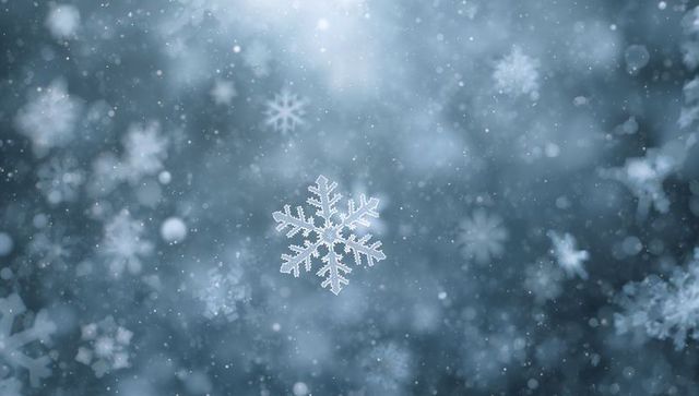 Floating central snowflake shimmering in frosty macro winter bokeh background with soft glow