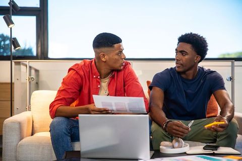 Colleagues Collaborating Casually in Modern Office