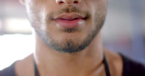 Focused Athlete Perspiring During Intense Workout