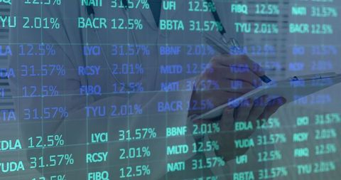 Financial analyst reviewing digital data visualization at office